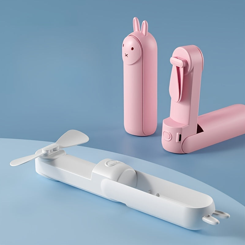 Mini Handheld Ventilator – 2-in-1 USB Rechargeable Fan with Cute Rabbit Design for Travel and Summer