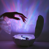 AquaAura Shell Lamp Speaker | Portable Bluetooth speaker with immersive ocean wave projection and ambient lighting