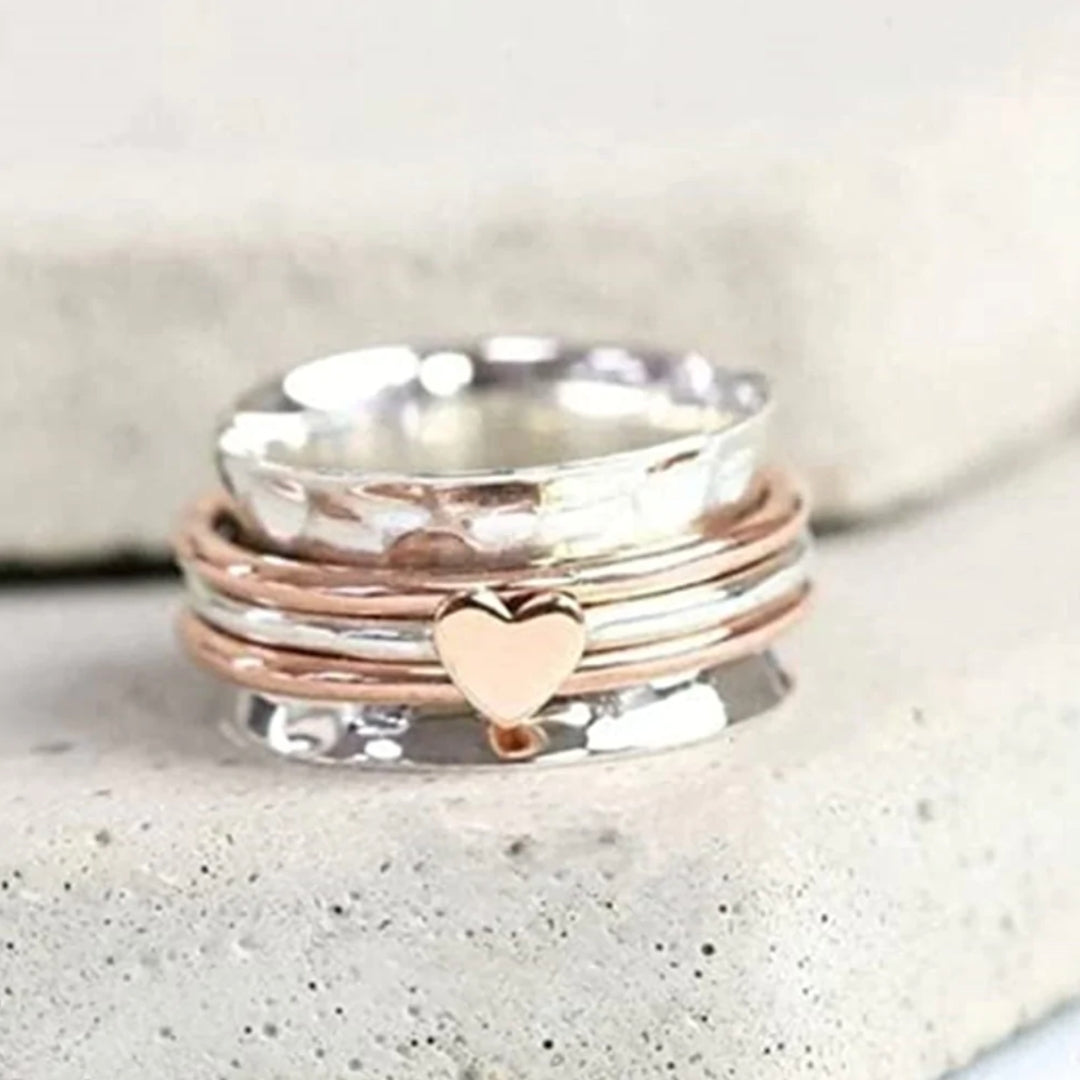 Rotating Heart Ring – Amara