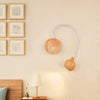 TimberGlow LED Wall Sconce | Elegant natural wood bedside lamp with directional lighting for indoor use