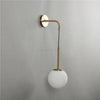 GlacioGlow Retro Glass Ball Sconce | Elegant post-modern bedside lamp for warm ambient lighting