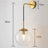 GlacioGlow Retro Glass Ball Sconce | Elegant post-modern bedside lamp for warm ambient lighting