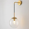 GlacioGlow Retro Glass Ball Sconce | Elegant post-modern bedside lamp for warm ambient lighting