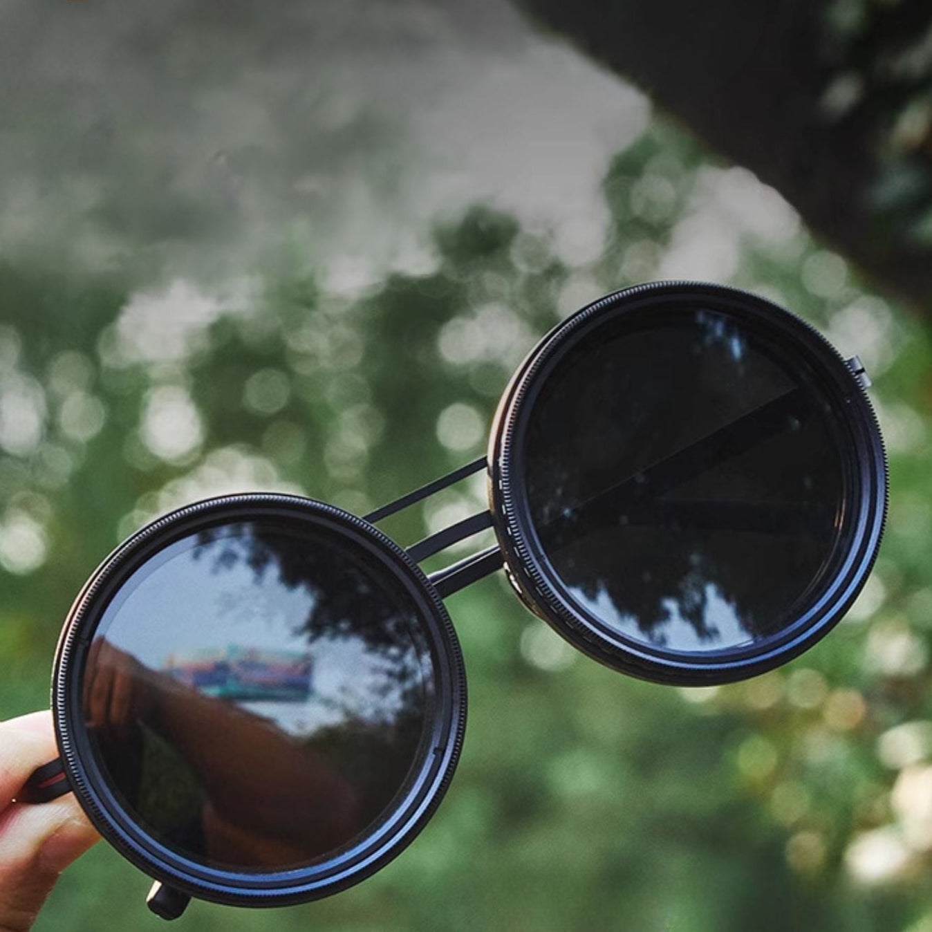 Unisex - Round Sunglasses - Adjustable Light Reduction - Polarised Metal