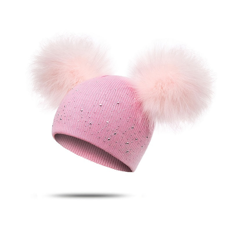 Lily Girls' Pom Pom Hat - Playful and Warm for the Winter Months