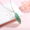 Stylish Crystal and Tree of Life Gemstone Necklace – Elara