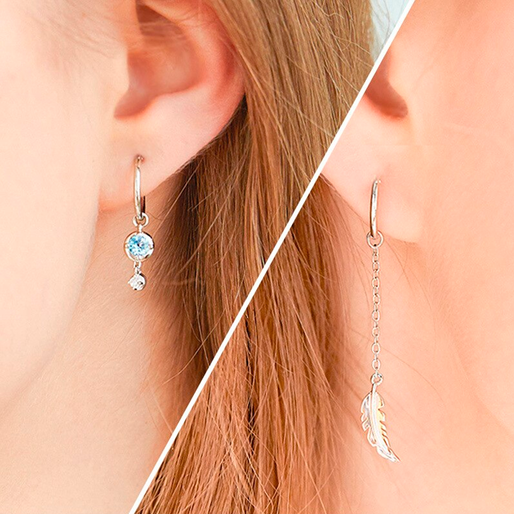 Feather Moonstone | Sterling Silver Asymmetrical Feather Earrings, White Moonstone