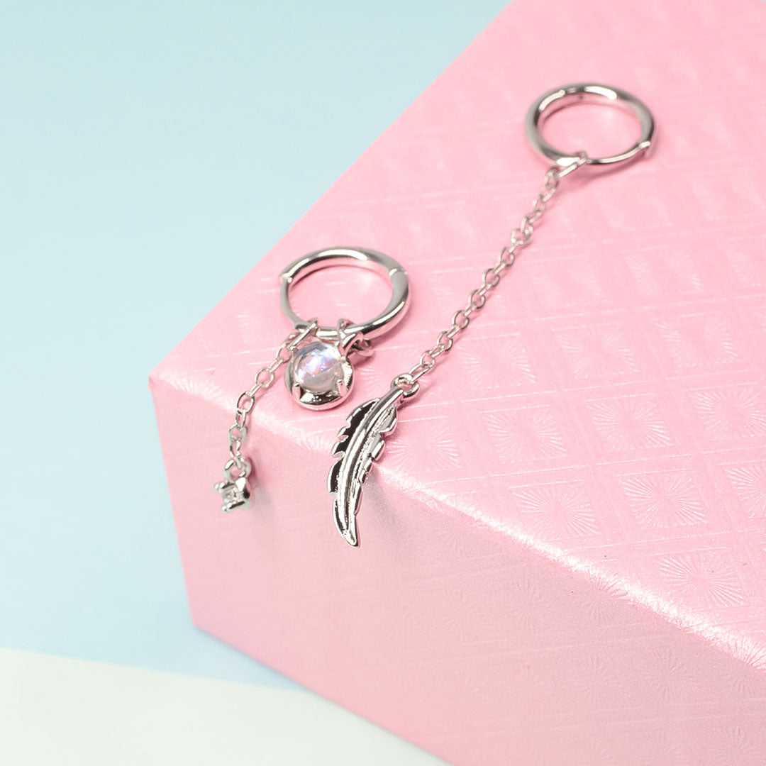 Feather Moonstone | Sterling Silver Asymmetrical Feather Earrings, White Moonstone