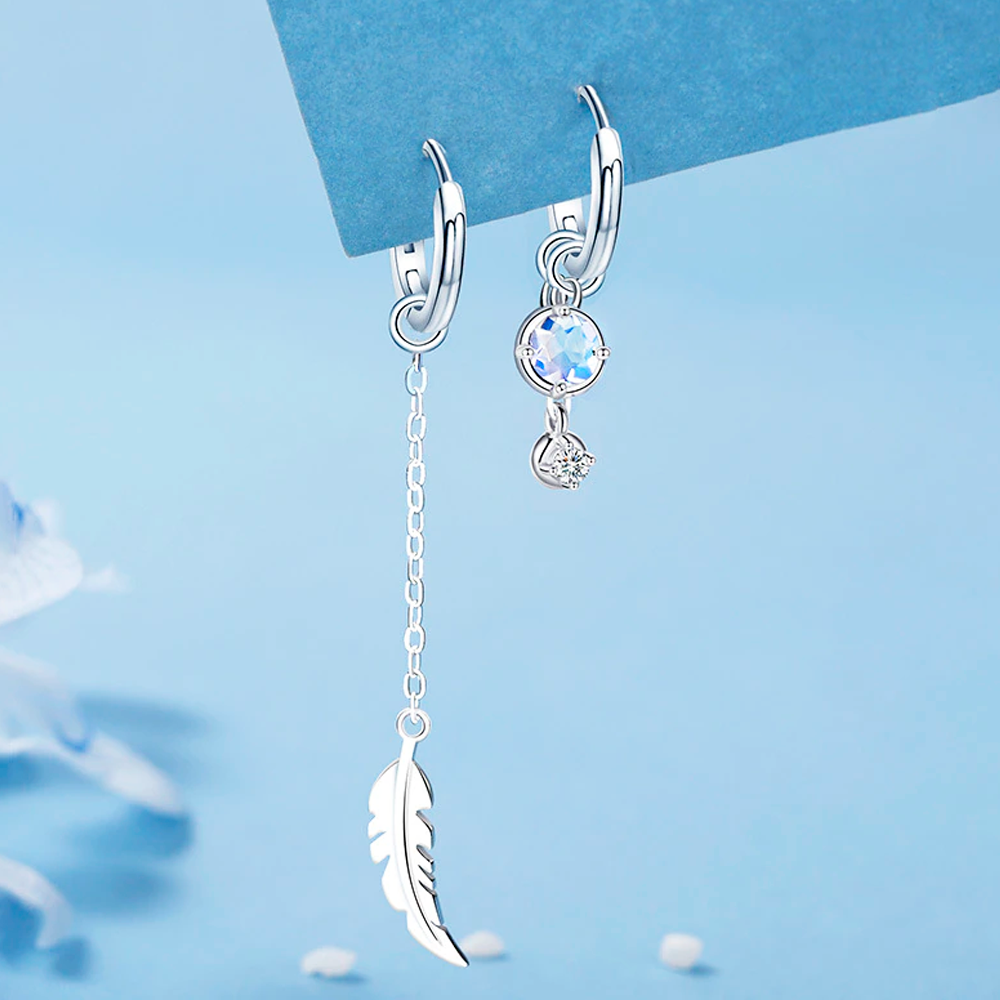 Feather Moonstone | Sterling Silver Asymmetrical Feather Earrings, White Moonstone
