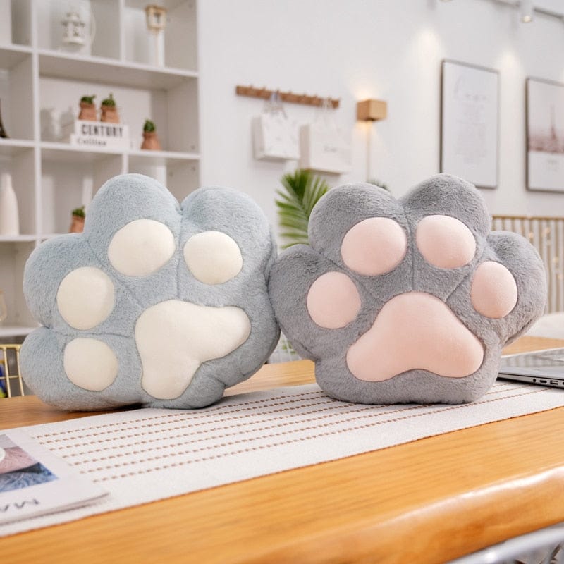 VeluPaws Heated Plush Cushion | Adorable cat paw hand warmer with a built-in heat pack and a soft blanket—perfect for chilly days.