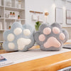 VeluPaws Heated Plush Cushion | Adorable cat paw hand warmer with a built-in heat pack and a soft blanket—perfect for chilly days.