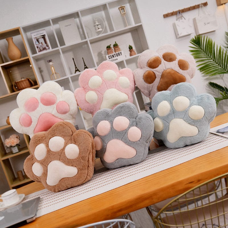 VeluPaws Heated Plush Cushion | Adorable cat paw hand warmer with a built-in heat pack and a soft blanket—perfect for chilly days.