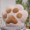 VeluPaws Heated Plush Cushion | Adorable cat paw hand warmer with a built-in heat pack and a soft blanket—perfect for chilly days.