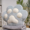 VeluPaws Heated Plush Cushion | Adorable cat paw hand warmer with a built-in heat pack and a soft blanket—perfect for chilly days.