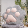 VeluPaws Heated Plush Cushion | Adorable cat paw hand warmer with a built-in heat pack and a soft blanket—perfect for chilly days.