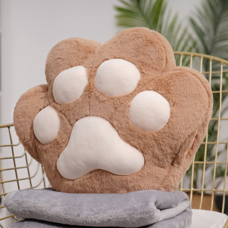 VeluPaws Heated Plush Cushion | Adorable cat paw hand warmer with a built-in heat pack and a soft blanket—perfect for chilly days.